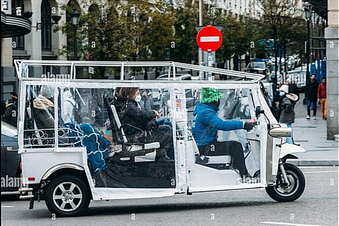 Private Panoramic Tuk Tuk Tour in Madrid - Neptune Fountain and Madrid’s grand avenues