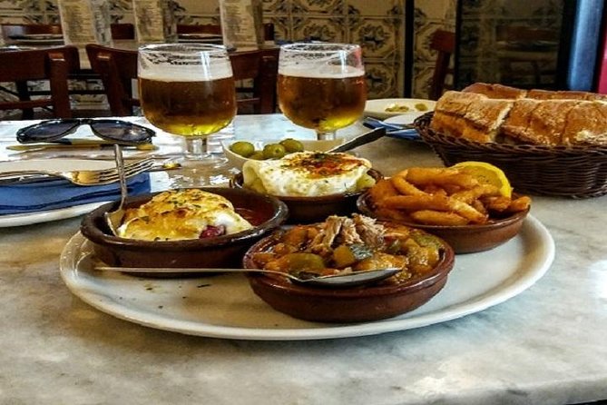 Private Tapas Tour (Only your group will participate) - Ending with churros and chocolate on Calle del Arenal