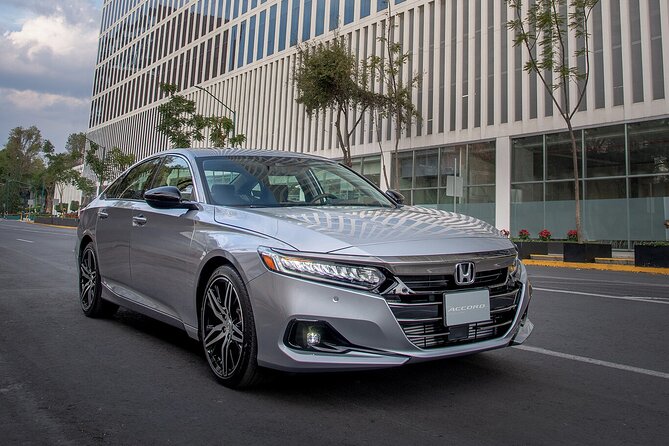 Round Trip Transfer from Madrid Airport MAD to Madrid by Sedan - Your first ride from Madrid Airport to the city
