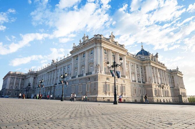 Royal Palace of Madrid Skip the Line Guided Tour - Crossing the Palace Threshold