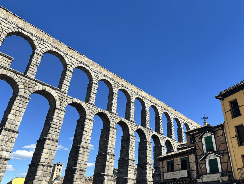 Segovia: private tour with Alcazar, Cathedral and wine tasting - Starting beneath the Roman Aqueduct