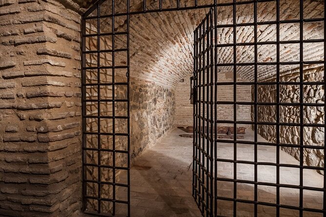 Toledo Underground Tour Visit Thermae and Private Basements - Walking through Toledo’s old center between entrances