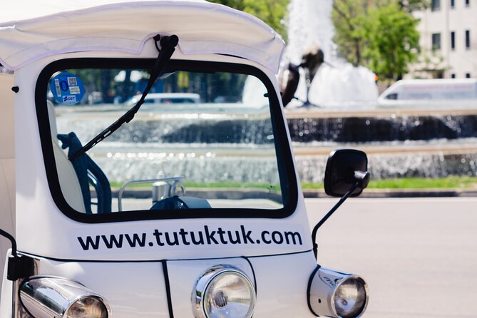 Tour of Historic and Modern Madrid with a guide in a yellow tuk tuk - Gran Vía, shopping streets, and the city’s main artery