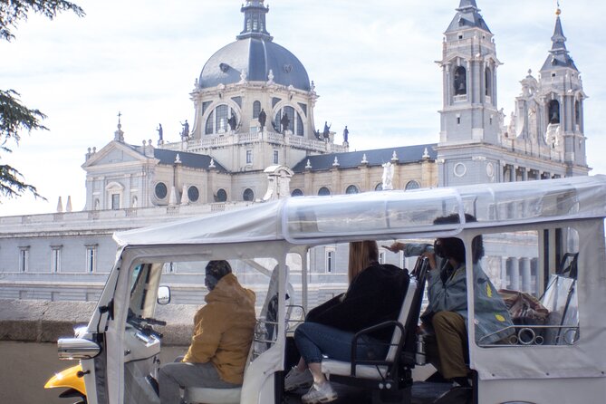 Tour of Historic and Modern Madrid with a guide in a yellow tuk tuk - Business Madrid and the modern city