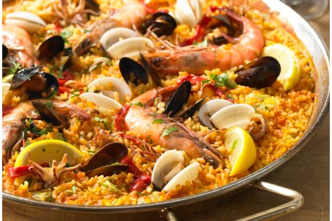 Traditional Paella & Sangría Workshop & Spanish Meal in Madrid - Sharing the finished meal in central Madrid